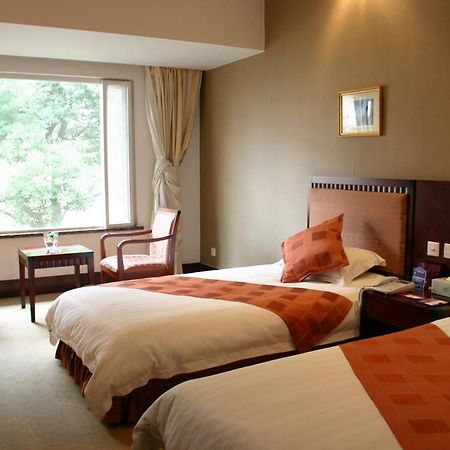 Suzhou Taoyuan International Holiday Hotel Habitación foto