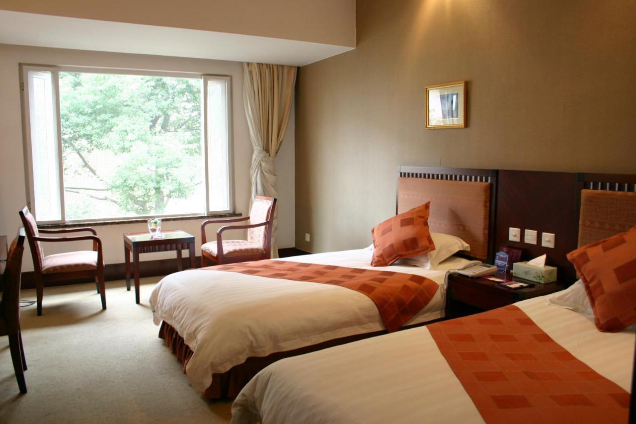 Suzhou Taoyuan International Holiday Hotel Habitación foto
